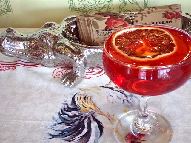 a glass of beer on a table
